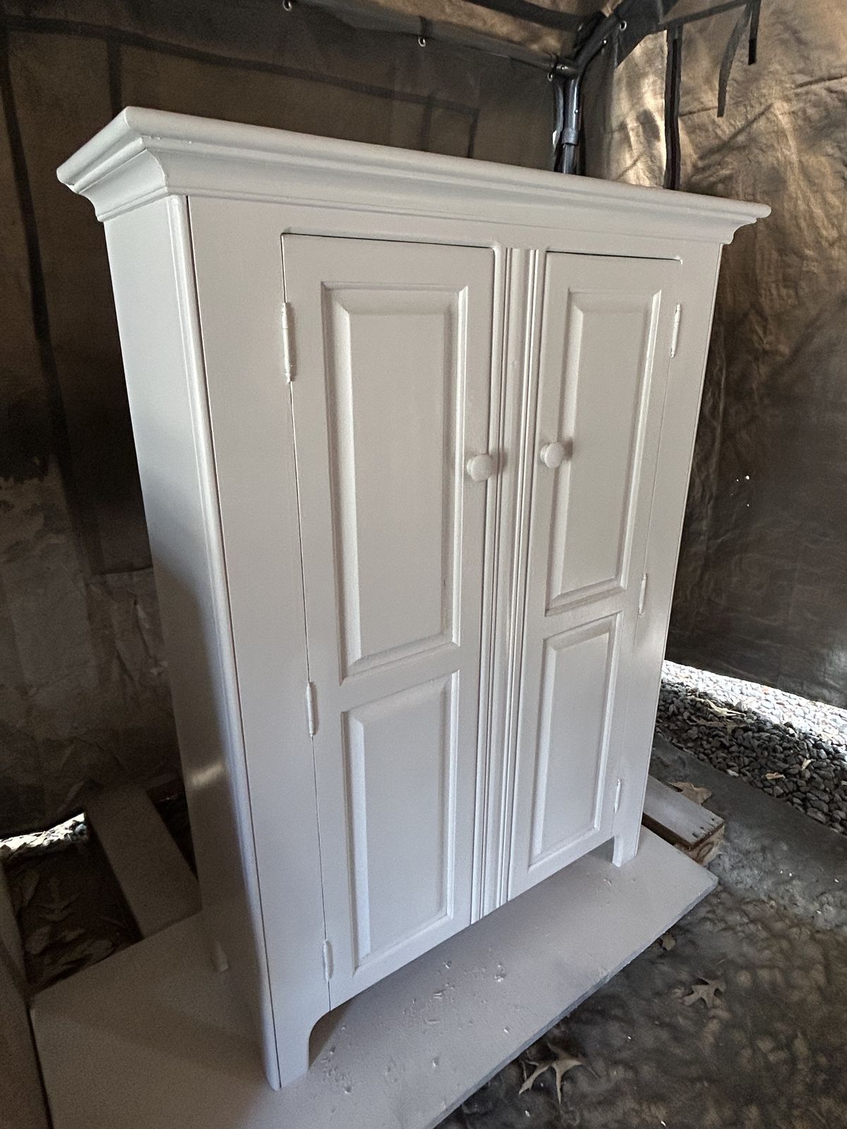 Tall cabinet piece refinished in white paint