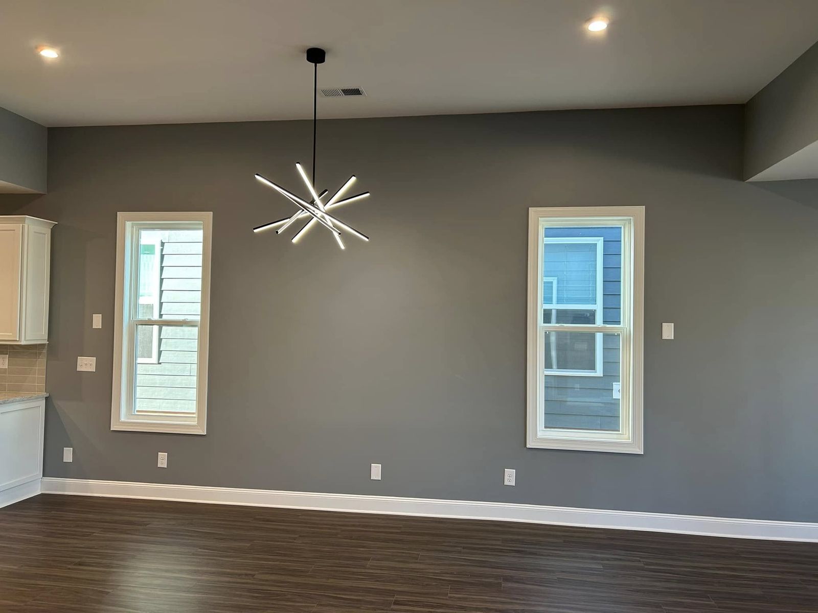 Living room with gray painted walls and white trim